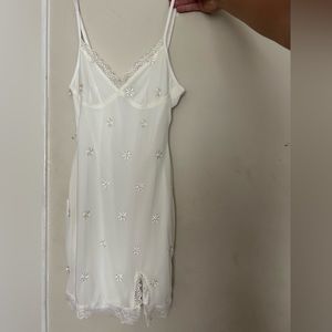 short, tight ish dress with a slit